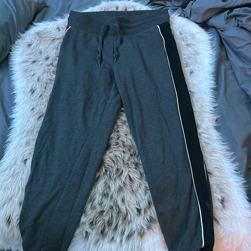 Sweat pants with cool stripes down the sides that uncle black and white!
